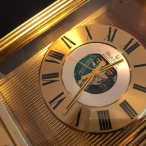 A clock that is on the wall of a room.