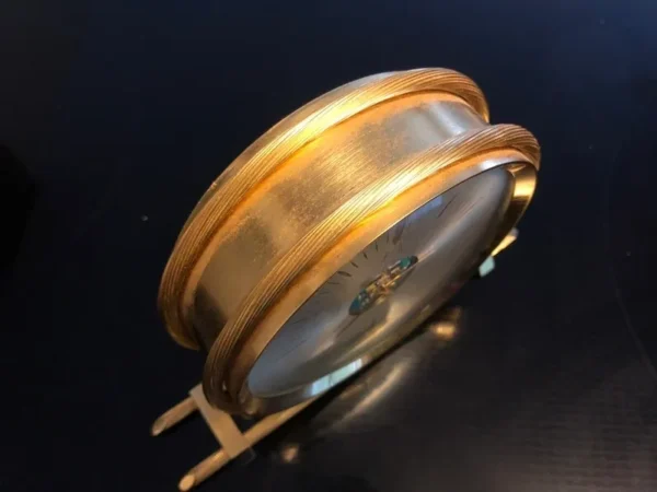 A close up of the side of a gold ring