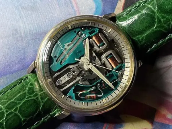 A watch with some parts missing on it