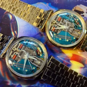 Two watches are shown on a colorful background.