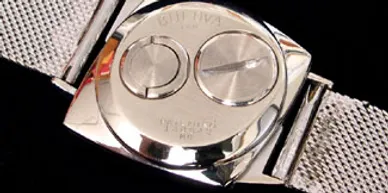 A close up of the face of an analog watch