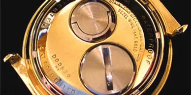 A close up of the two dials on a watch