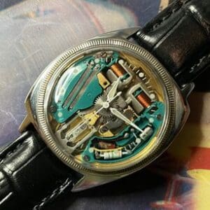 A watch with some parts missing on the side of it