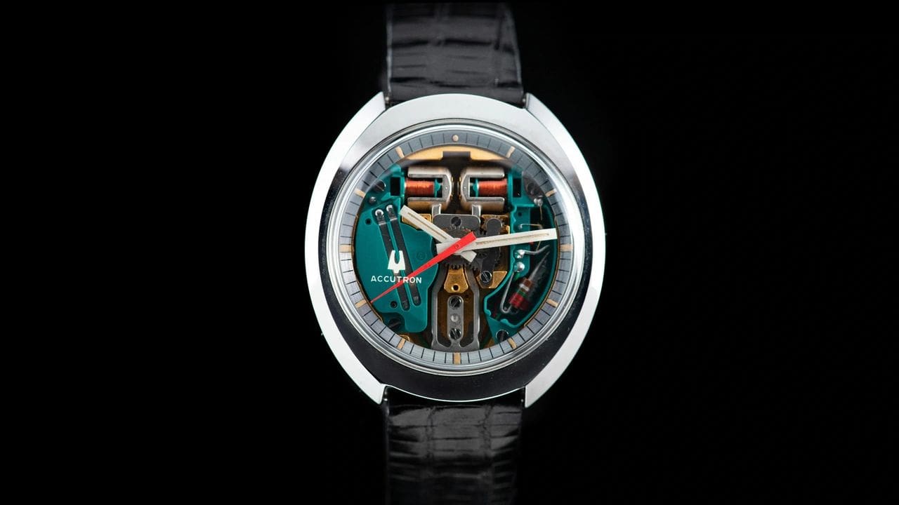 Accutron watch with exposed mechanism.