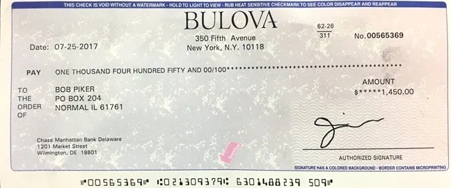 Bulova check payable to Bob Piker.