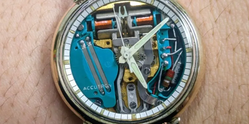 A watch with parts inside of it