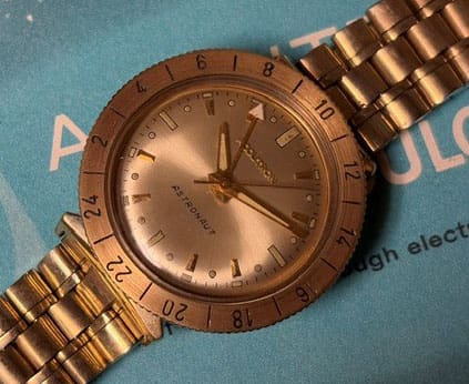 Solid 14k Bezel Accutron Astronaut with Champion Bullet Braclet