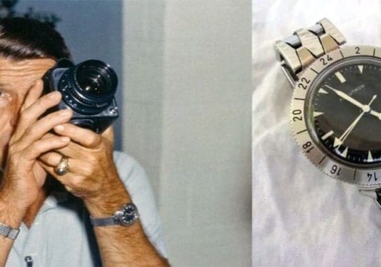 Man with camera and wristwatch.