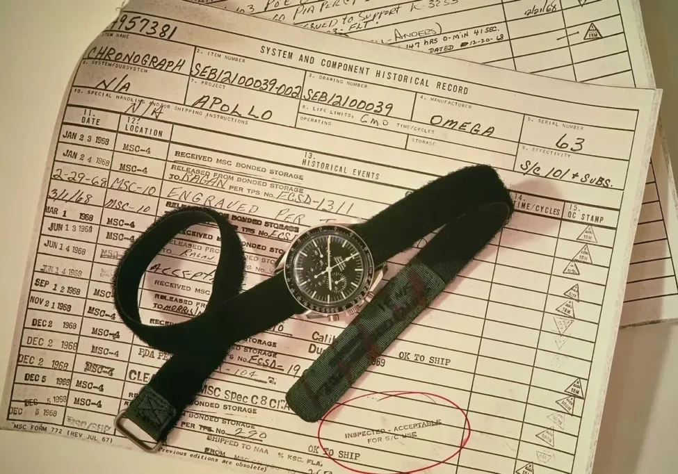 Omega Speedmaster watch on a historical record.