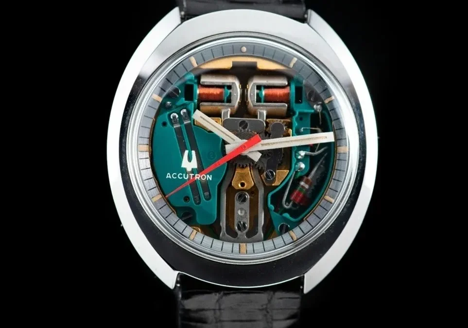 Accutron watch with exposed mechanism.