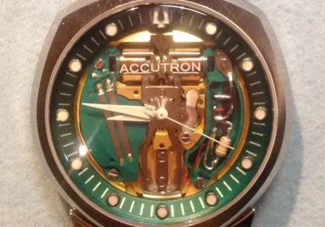 Accutron watch with exposed mechanism.