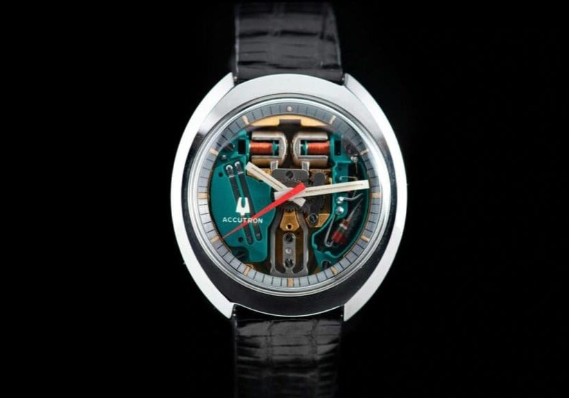 Accutron watch with exposed mechanism.