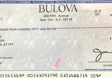 Bulova check payable to Bob Piker.